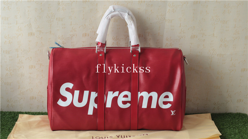 Supreme LVS Traveling Red Duffle Bag